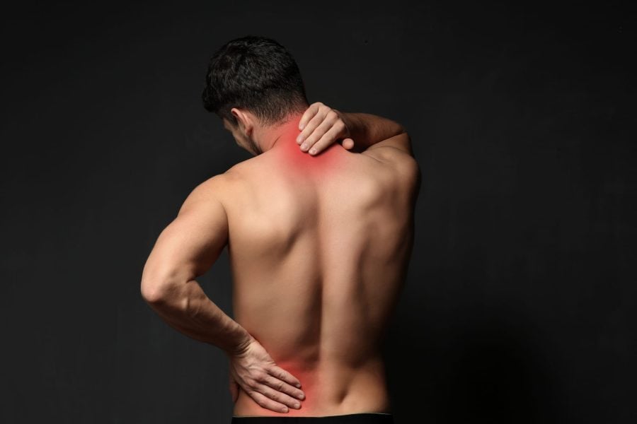 Exercising-With-Chronic-Pain Man With A Pain In His Neck And Lower Back